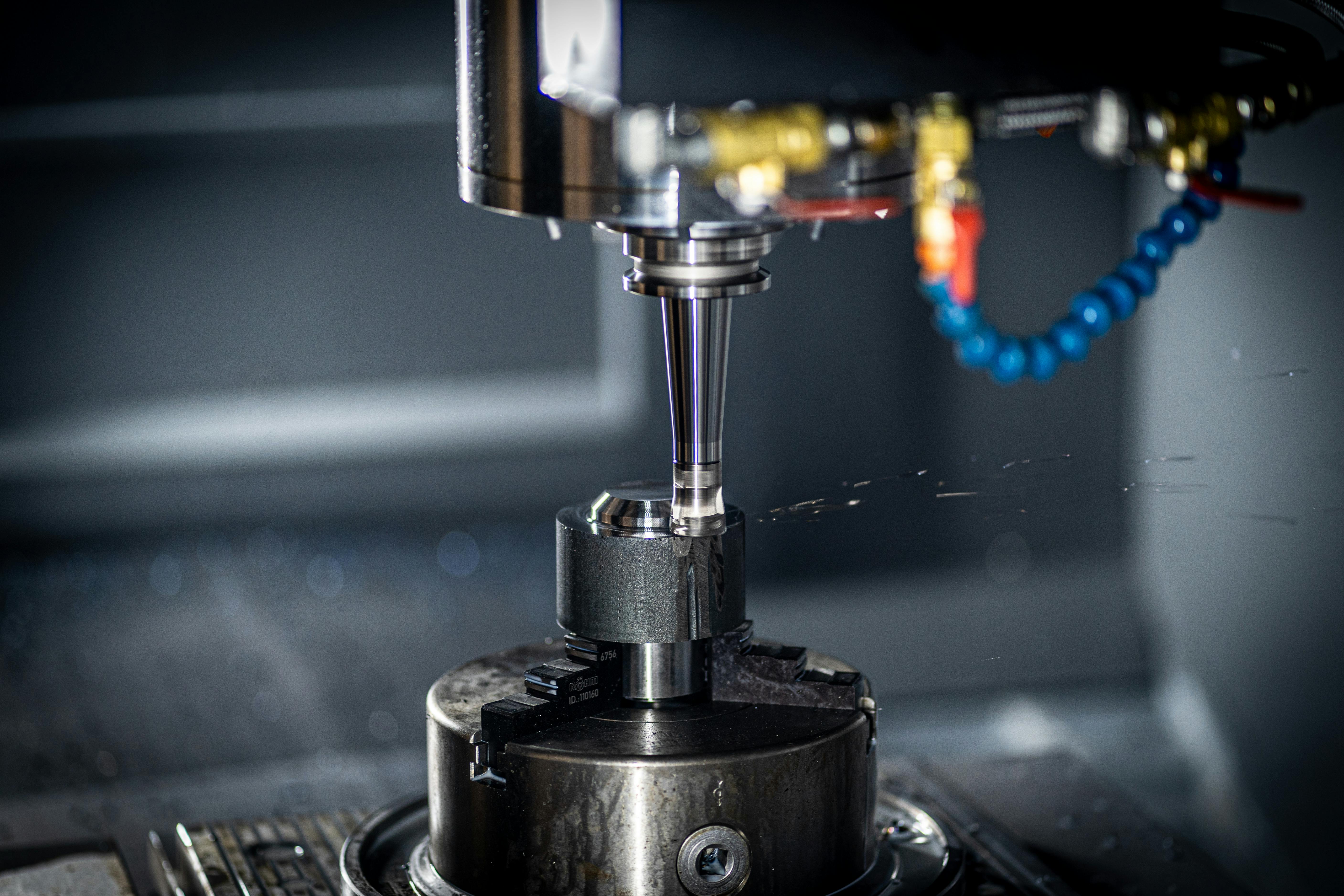 Close-up photo of a precision turning or milling operation